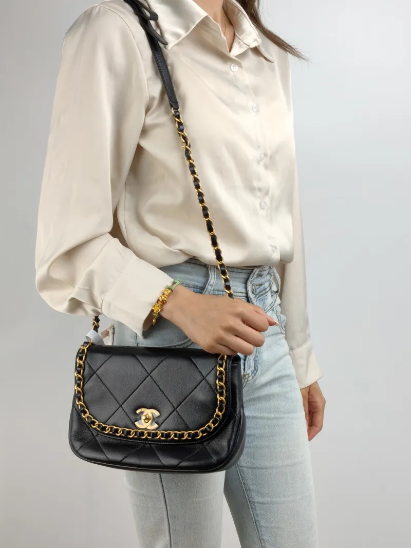 Chanel Crossbody Bag Crossbody Bag Black with Gold-Tone Hardware Lambskin One Size 24 × 6 × 15 cm — on-model view 2 of 2