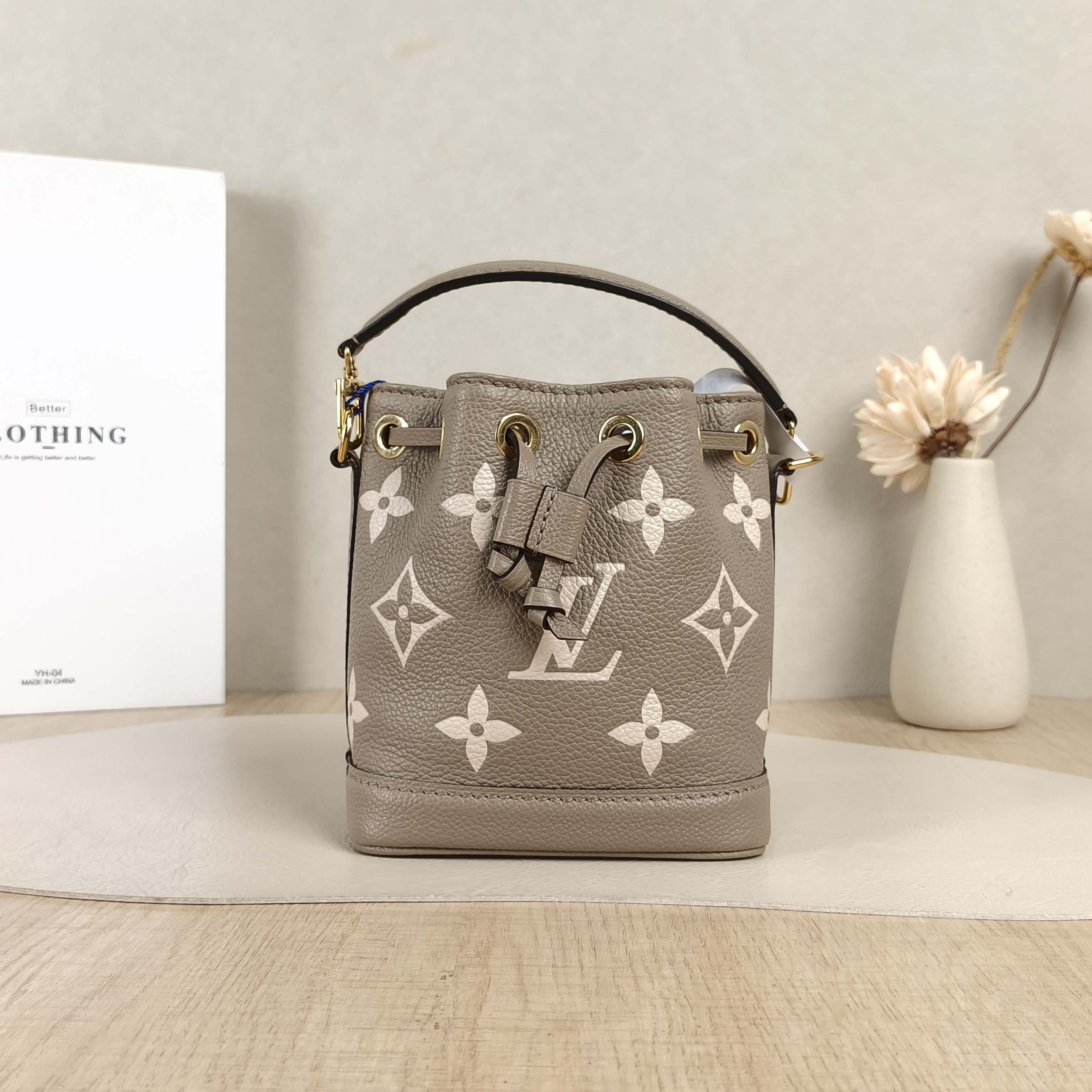 Louis Vuitton Crossbody Bag NANO NOÉ Bucket Bag Nano · White Empreinte Embossed Calfskin Monogram13 × 10 × 16 cm