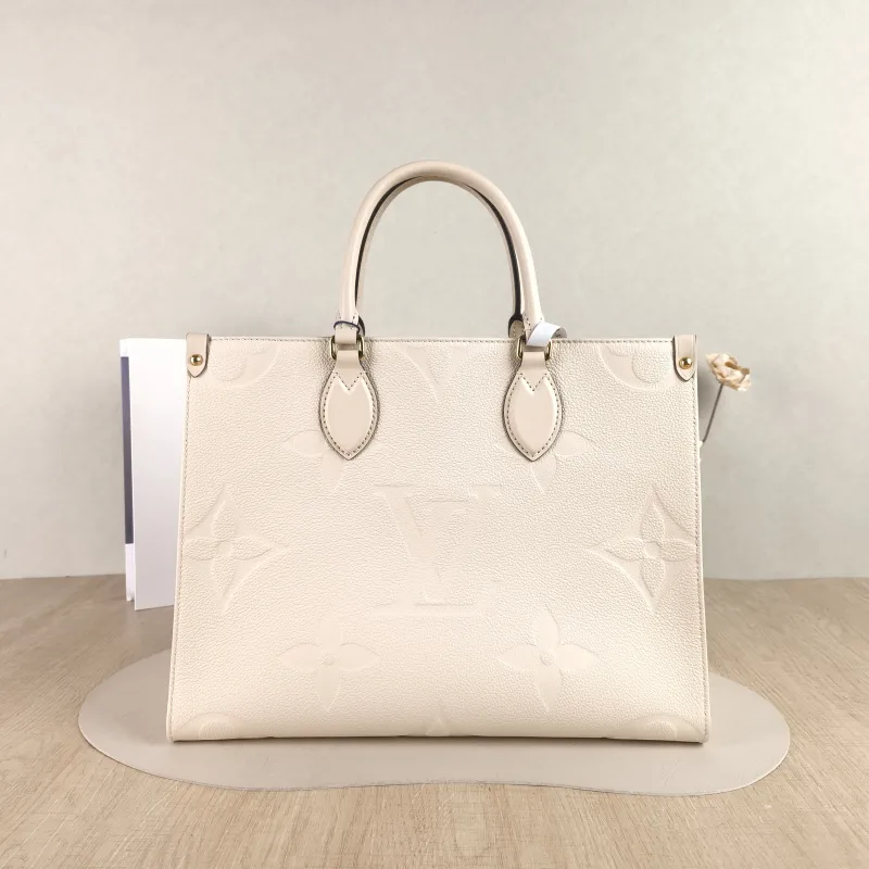Louis Vuitton Shoulder Bag Onthego Medium White Monogram Empreinte Embossed Calfskin Medium 35 × 14 × 27 cm — cover view 3 of 4