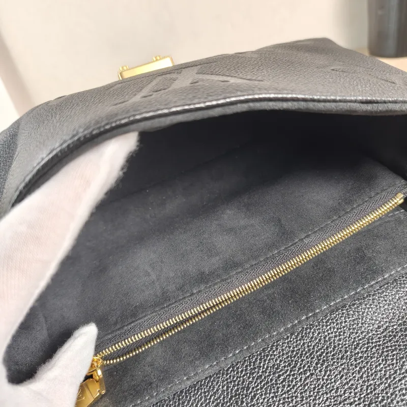 Louis Vuitton Crossbody Bag MADELEINE Black Monogram Empreinte Embossed Calfskin Medium 30 × 11 × 19.5 cm — detail view 5 of 12