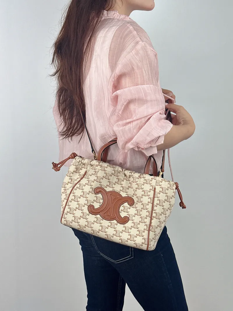 CELINE Top Handle Bag CABAS TRIOMPHE White PVC Small 22 × 15 × 17 cm — on-model view 2 of 2
