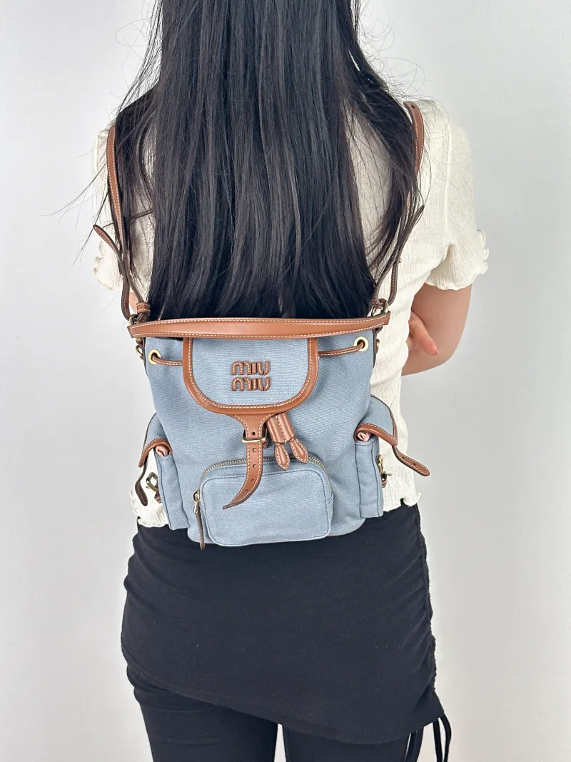 Miumiu Backpack Blue Brown Canvas One Size18 × 11 × 21 cm — on-model view 1 of 2