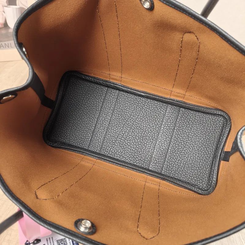 Hermès Top Handle Bag Garden Party 30 30 Brown Canvas · Negonda Calfskin Medium 30 × 13 × 21 cm B — detail view 8 of 9