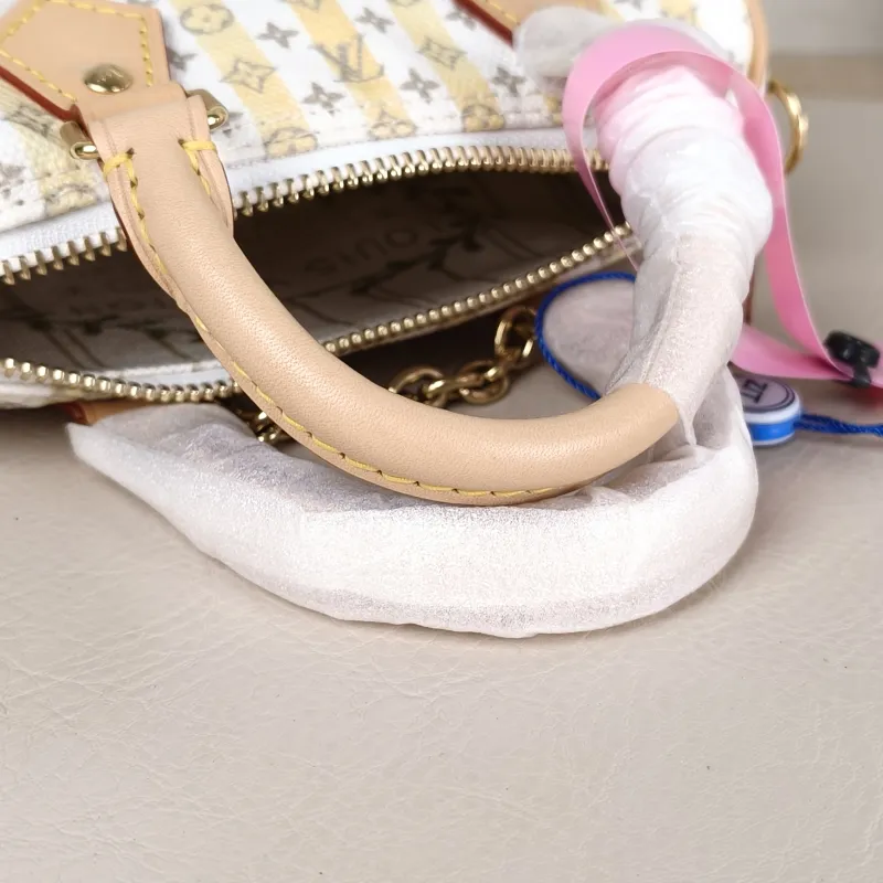 Louis Vuitton Crossbody Bag Speedy Nano White Yellow Monogram PVC nano 16 × 7.5 × 10 cm — detail view 11 of 11