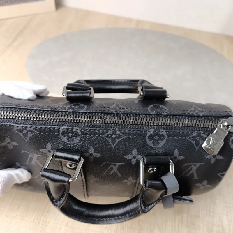 Louis Vuitton Crossbody Bag Keepall 25 PVC Medium 25 × 11 × 15 cm — detail view 6 of 12