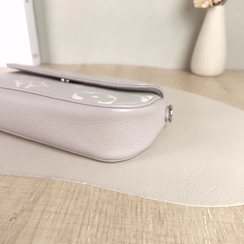 Louis Vuitton Crossbody Bag IVY Grey · White Monogram Empreinte Embossed Calfskin Small 23.5 × 4.3 × 12 cm — detail view 6 of 11