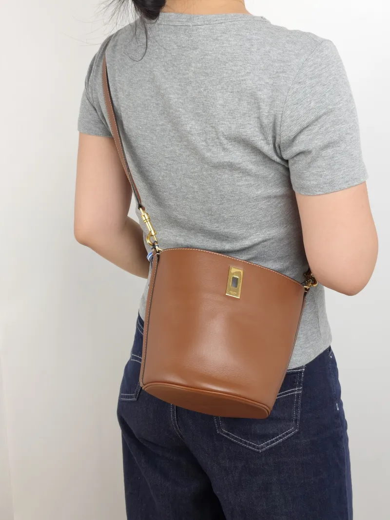 CELINE Crossbody Bag Bucket 16 Bucket Bag Caramel Calfskin Small 16 × 16 × 18 cm — on-model view 3 of 3