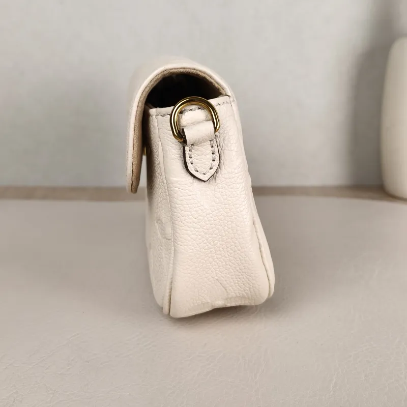 Louis Vuitton Crossbody Bag IVY White Monogram Empreinte Embossed Calfskin Small 23.5 × 4.3 × 12 cm — detail view 4 of 11