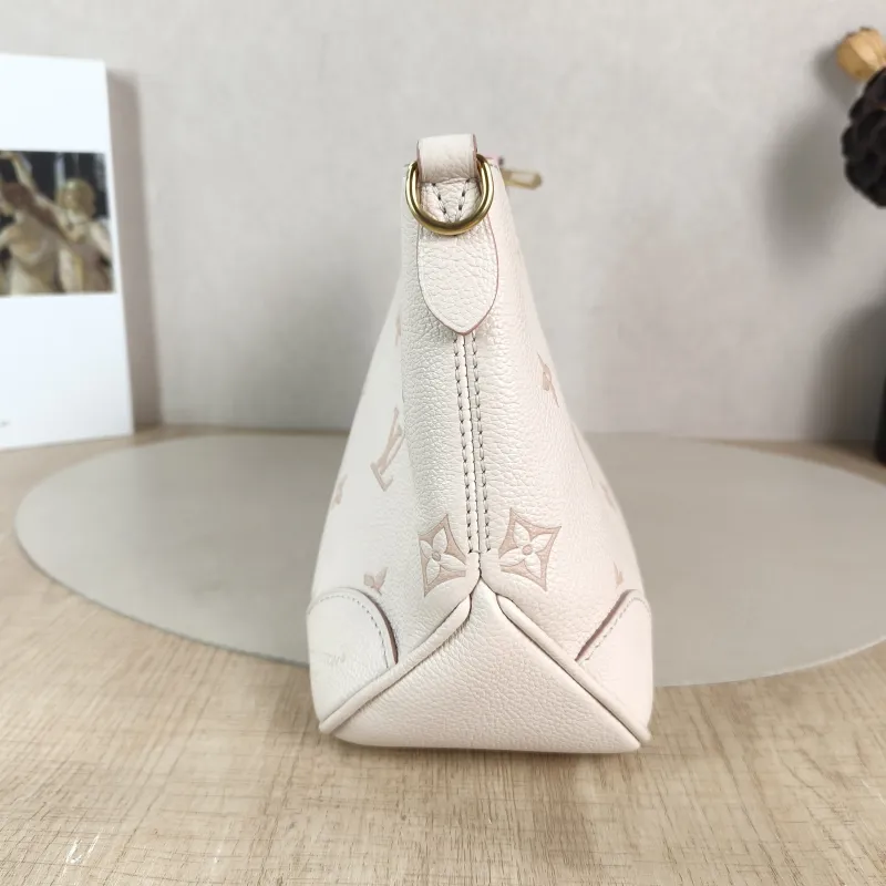 Louis Vuitton Crossbody Bag Boulogne Beige Monogram Empreinte Embossed Calfskin Small 26 × 9.5 × 16 cm — detail view 8 of 11