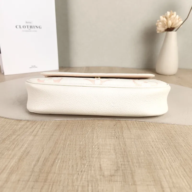 Louis Vuitton Crossbody Bag IVY White · Pink Monogram Empreinte Embossed Calfskin Small 23.5 × 4.3 × 12 cm — cover view 4 of 5