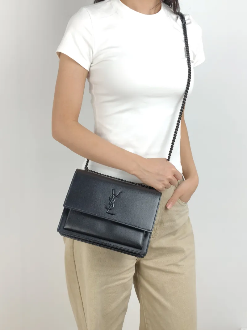 SAINT LAURENT Crossbody Bag SUNSET Black Calfskin Medium 22 × 6.5 × 16 cm — on-model view 2 of 3