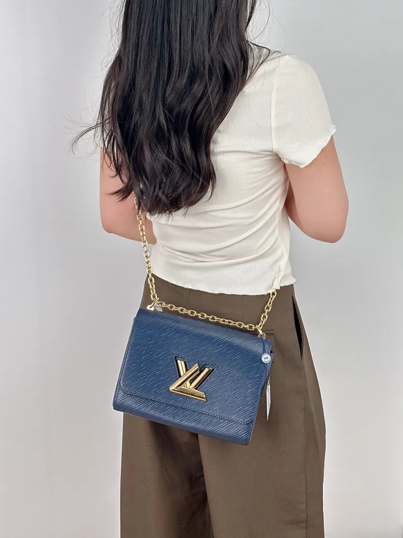 Louis Vuitton Crossbody Bag Twist Blue Epi Embossed Calfskin Medium23 × 9.5 × 17 cm — on-model view 2 of 2