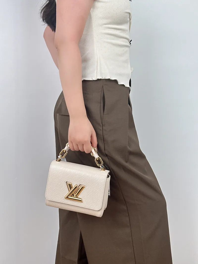 Louis Vuitton Crossbody Bag Twist White Epi Embossed Calfskin Small19 × 9 × 15 cm — on-model view 3 of 3