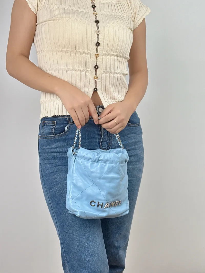 Chanel Shoulder Bag22Bag Blue CC alfskinmini20 × 6 × 19 cm — on-model view 1 of 2