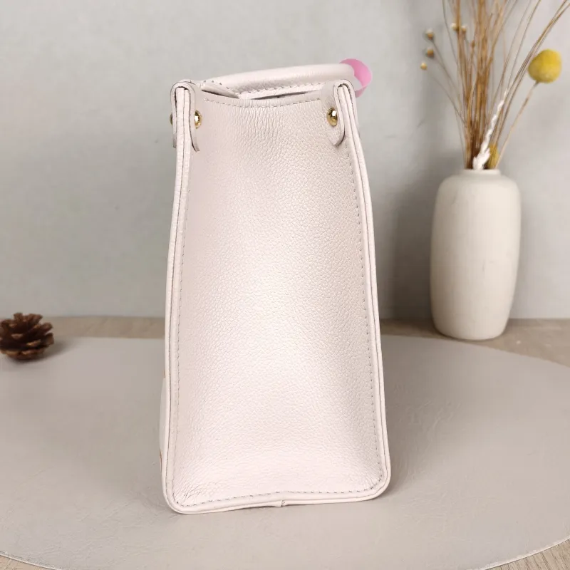 Louis Vuitton Shoulder Bag Onthego Beige Empreinte Embossed Calfskin Small 25 × 11.5 × 19 cm — detail view 9 of 9
