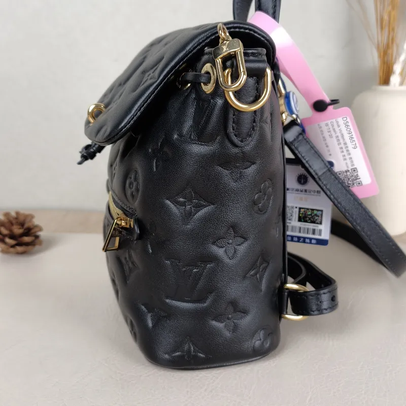 Louis Vuitton Backpack Coussin Backpack Black with Gold-Tone Hardware Lambskin Mini 15 × 7.5 × 20 cm — detail view 14 of 14