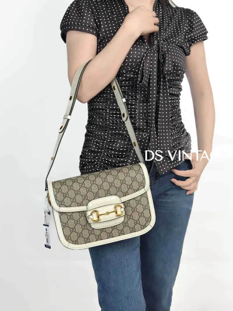 GUCCI Crossbody Bag Horsebit 1955 Horsebit Small White Monogram PVC Small 20.5 × 5 × 14.5 cm — on-model view 2 of 3