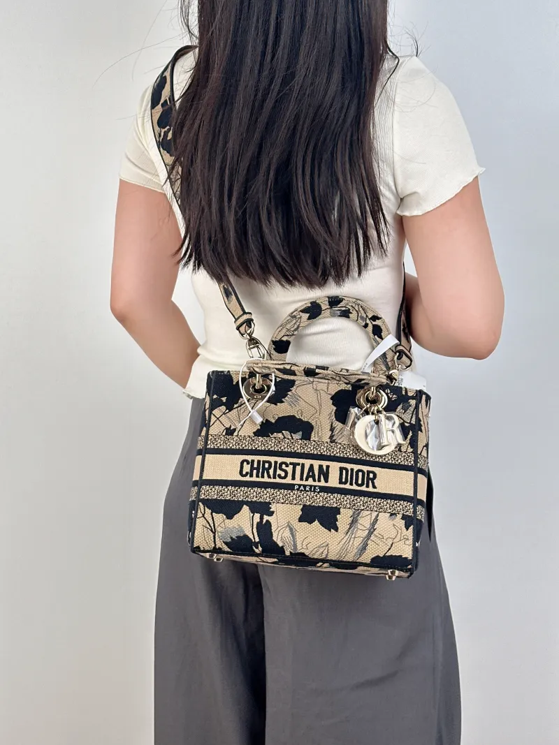 DIOR Top Handle Bag Lady Lady Dior Bag Beige Black Canvas Medium24 × 12 × 21 cm — on-model view 2 of 3