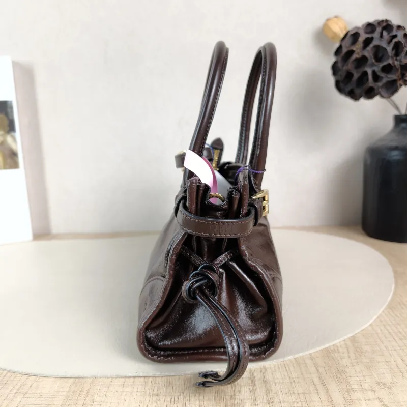 PRADA Top Handle Bag Bonnie Soft Lux Brown Waxed Leather Mini 23.5 × 9 × 12 cm — detail view 10 of 13