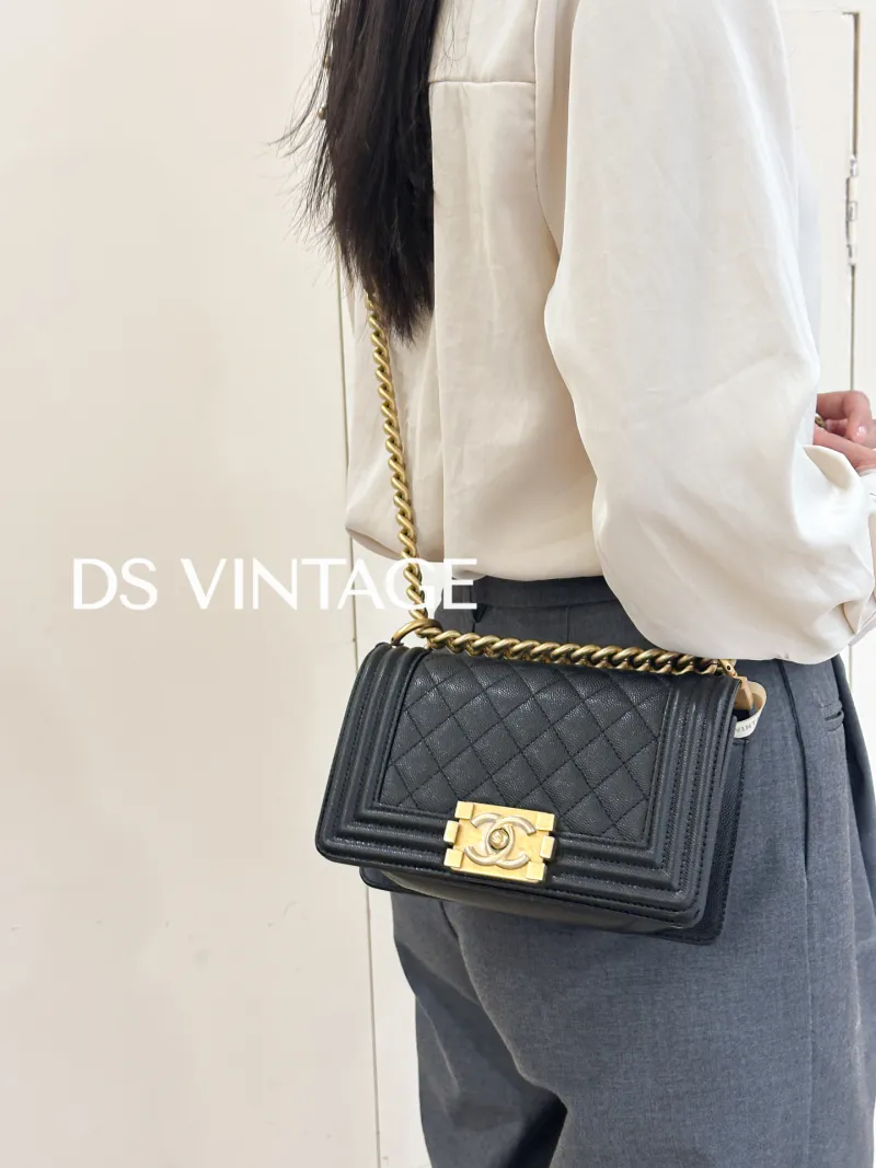 Chanel Crossbody Bag Le Boy​Black Grained Calfskin Small20.5 × 8.5 × 12 cm — on-model view 1 of 3