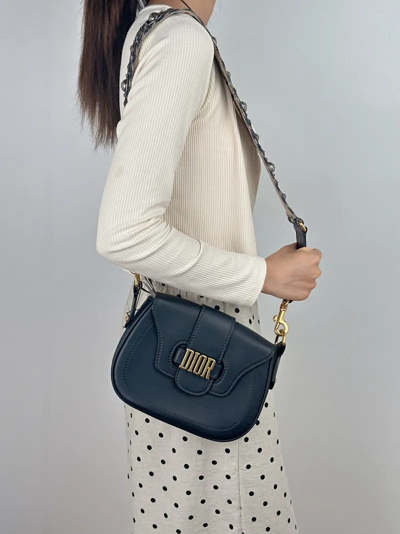 DIOR Crossbody Bag D-Fence Black Calfskin Medium 22.5 × 5 × 17.5 cm — on-model view 1 of 2