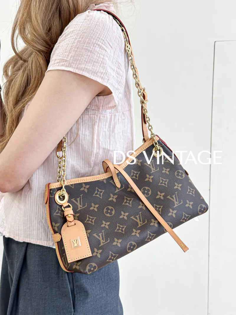 Louis Vuitton Crossbody Bag Carryall BB Monogram PVCBB26 × 10 × 17 cm — on-model view 1 of 3