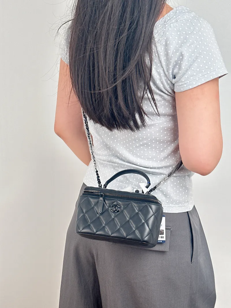 Chanel Crossbody Bag Edition Black Lambskin Mini 16 × 8 × 9.5 cm — on-model view 2 of 3
