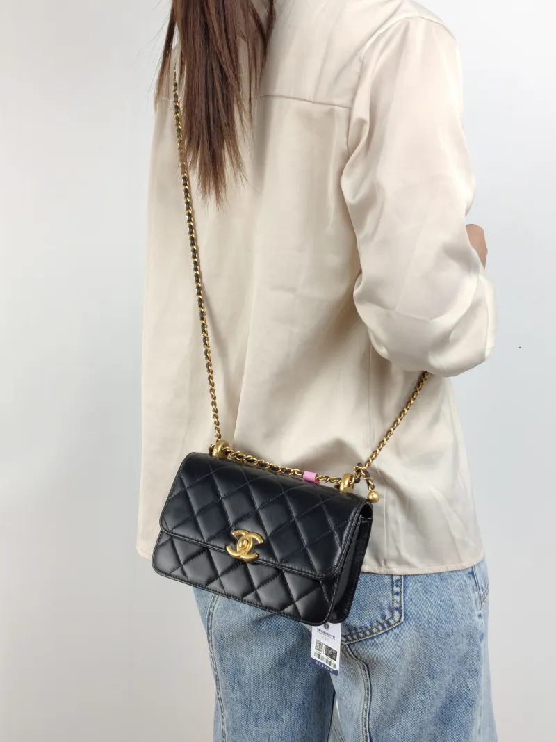 Chanel Crossbody Bag Black Calfskin Small 19 × 8 × 12 cm — on-model view 1 of 2