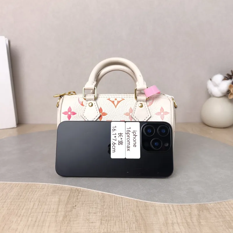 Louis Vuitton Crossbody Bag Speedy Nano Monogram Empreinte Embossed Calfskin nano 16 × 7.5 × 10 cm — cover view 4 of 5