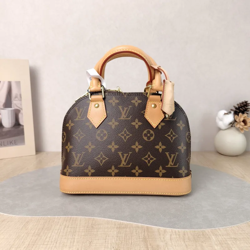 Louis Vuitton Crossbody Bag Alma BB Monogram PVC BB 23.5 × 11.5 × 17.5 cm