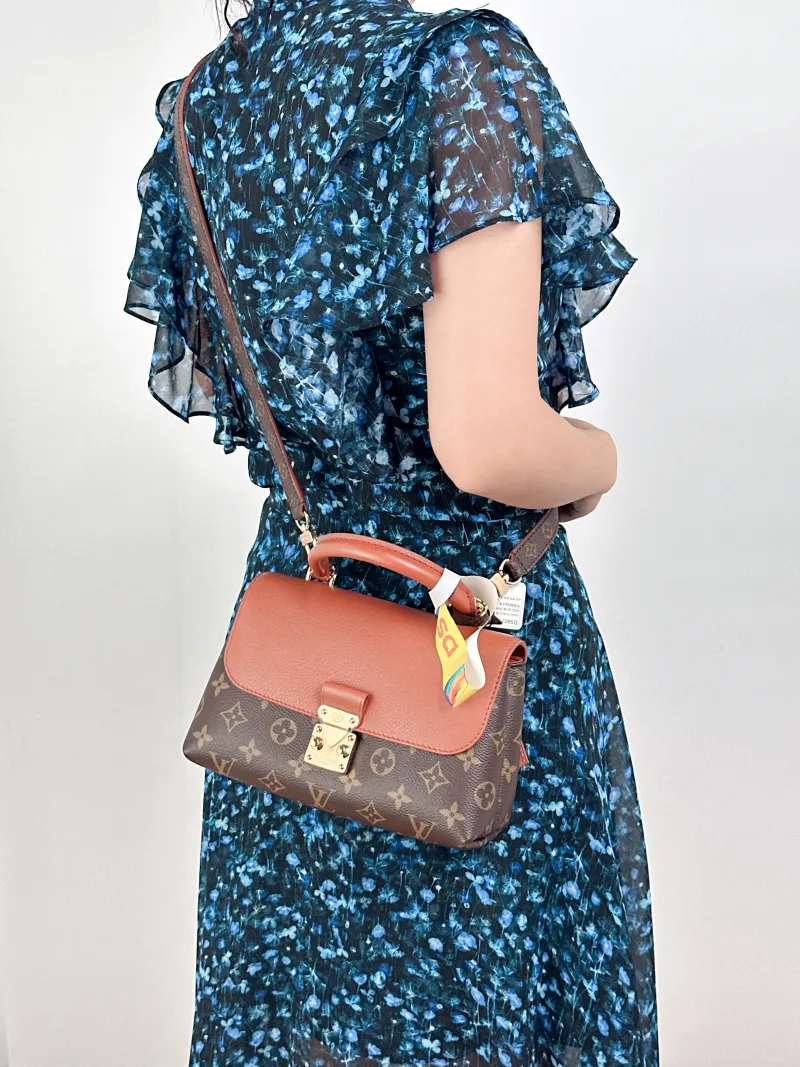 Louis Vuitton Crossbody Bag MADELEINE PVC · Calfskin BB24.5 × 8 × 16 cm — on-model view 2 of 2