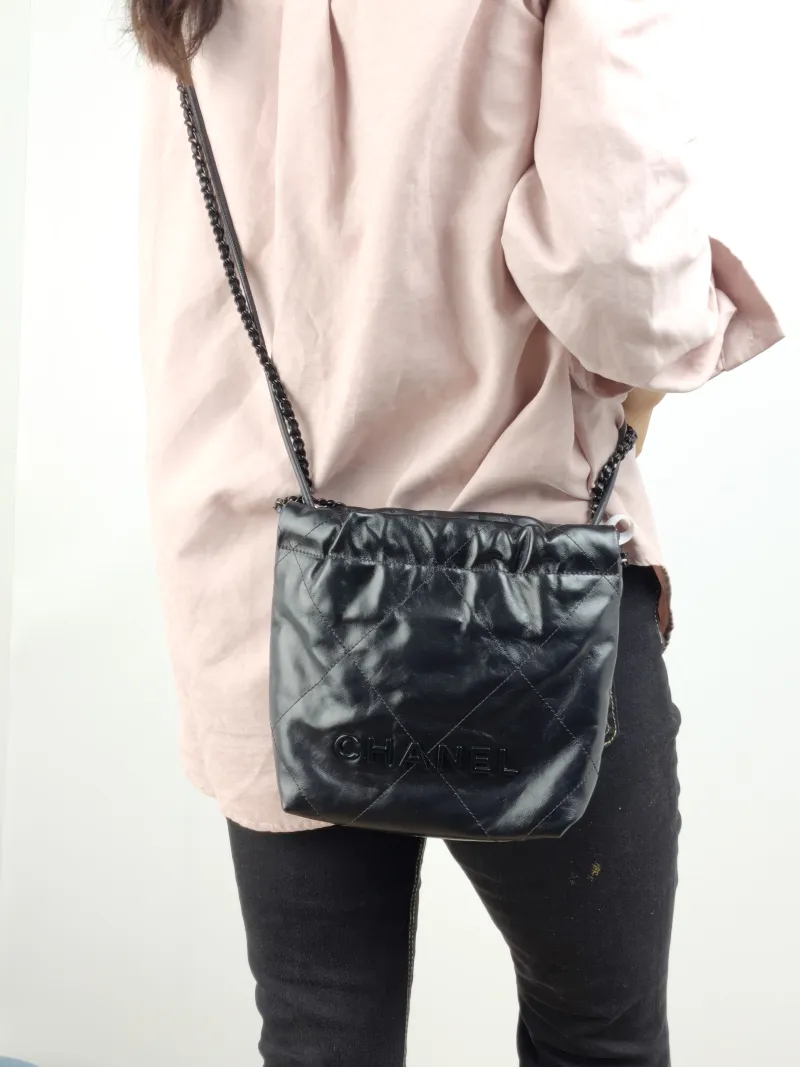 Chanel Shoulder Bag 22Bag Black CC alfskin Mini 20 × 6 × 19 cm — on-model view 2 of 2