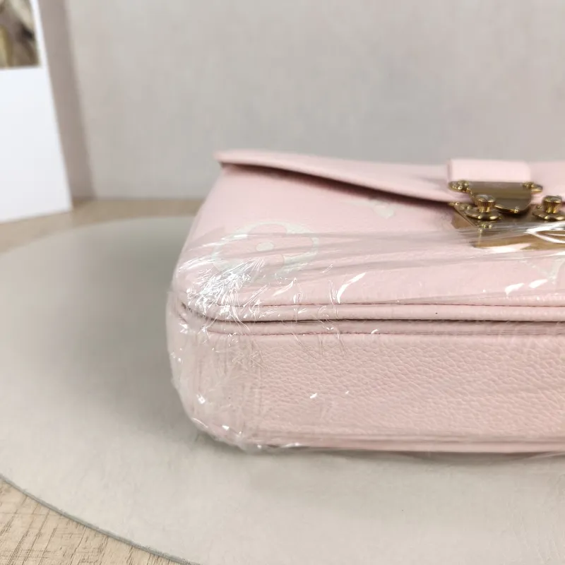 Louis Vuitton Crossbody Bag Pochette Métis East West Monogram Empreinte Embossed Calfskin Small 21.5 × 6 × 13.5 cm — detail view 2 of 12