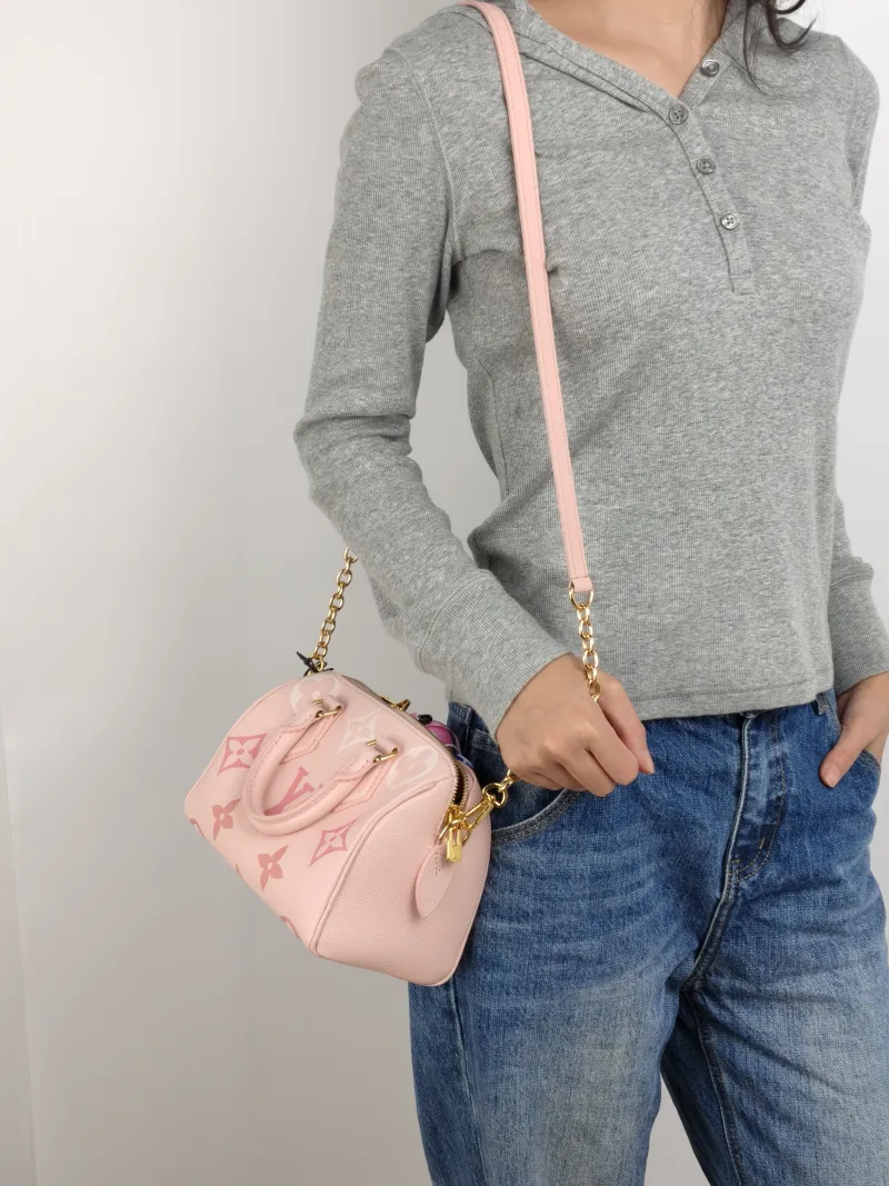 Louis Vuitton Crossbody Bag Speedy20 Pink Empreinte Embossed Calfskin Small 20.5 × 12 × 13.5 cm — on-model view 3 of 3