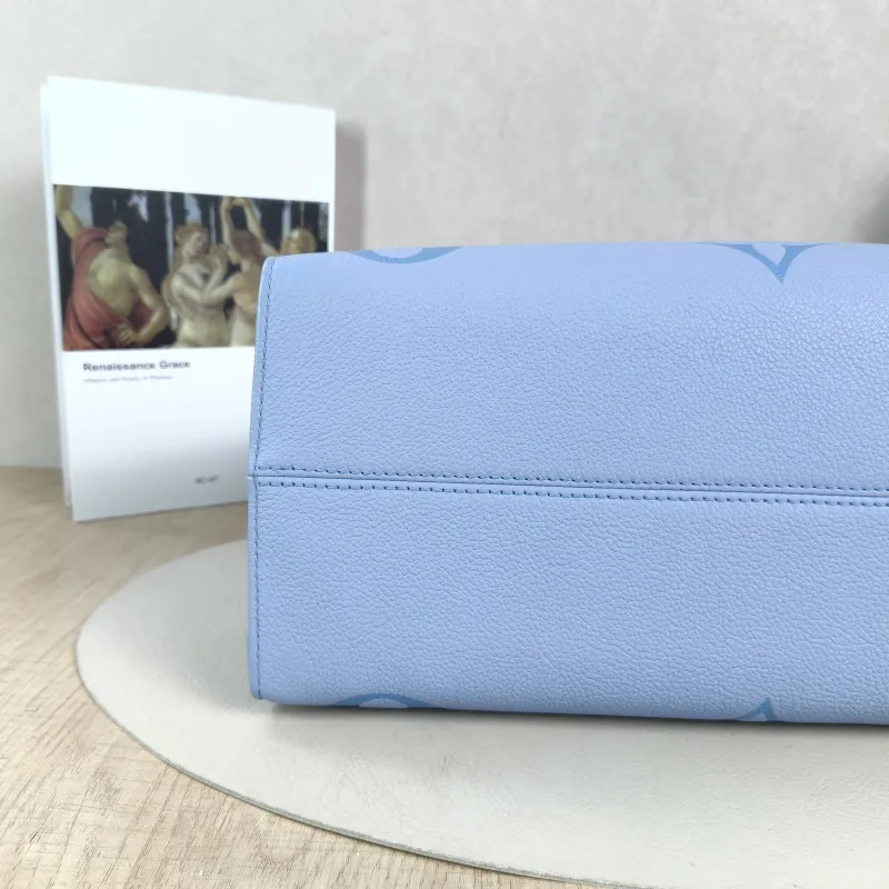 Louis Vuitton Shoulder Bag Onthego Medium Blue Monogram Empreinte Embossed Calfskin Medium35 × 14 × 27 cm — detail view 11 of 12