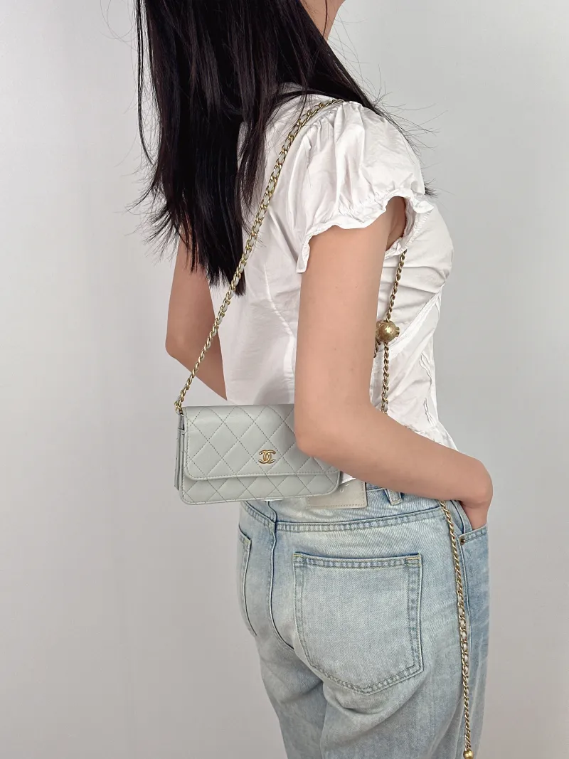 Chanel Crossbody Bag woc Collection Grey Lambskinmini17 × 5 × 9.5 cm — on-model view 2 of 3