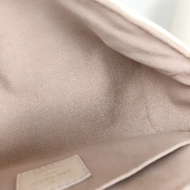 Louis Vuitton Crossbody Bag Favorite White · Pink Empreinte Embossed Calfskin Monogram Medium24 × 9 × 14 cm — detail view 2 of 14