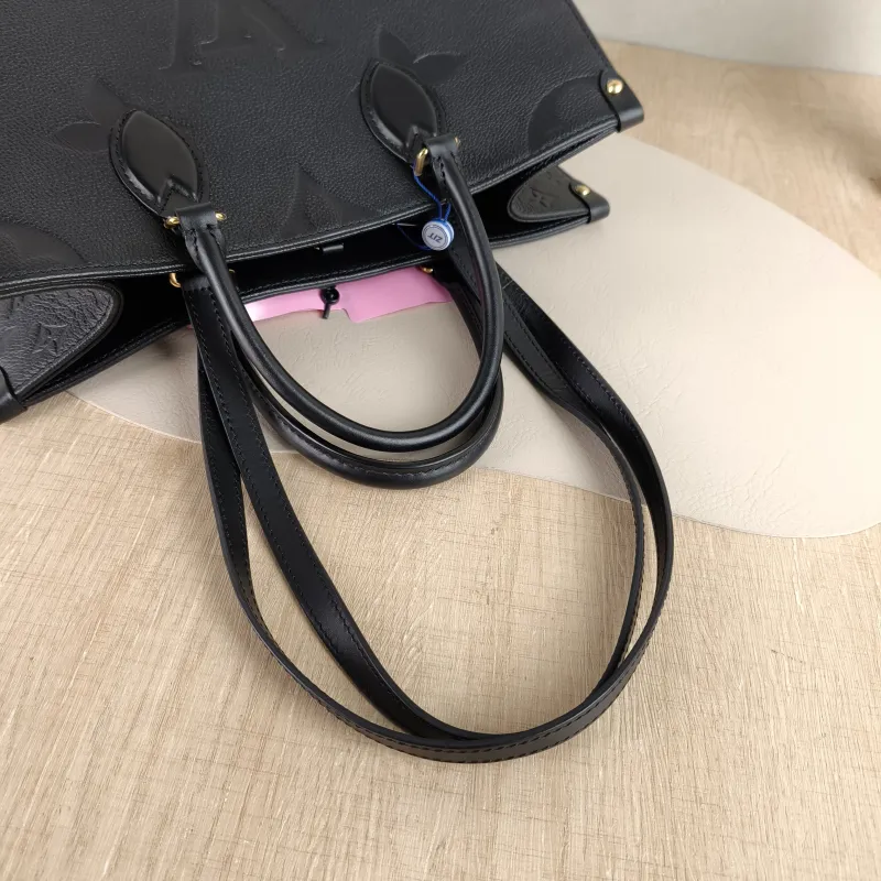 Louis Vuitton Shoulder Bag Onthego Medium Black Monogram Empreinte Embossed Calfskin Medium 35 × 14 × 27 cm — detail view 7 of 10