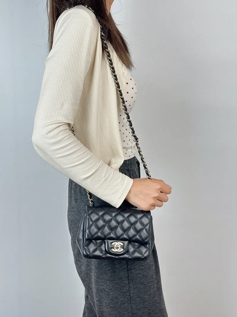 Chanel Crossbody Bag Classic Flap Mini CF Mini Black Lambskin One Size17 × 8 × 13.5 cm — on-model view 2 of 2