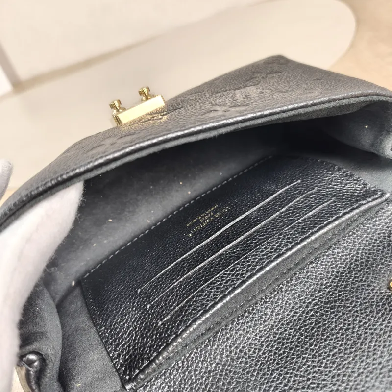 Louis Vuitton Crossbody Bag MADELEINE Black Monogram Empreinte Embossed Calfskin nano 21 × 6 × 12.5 cm — detail view 14 of 14