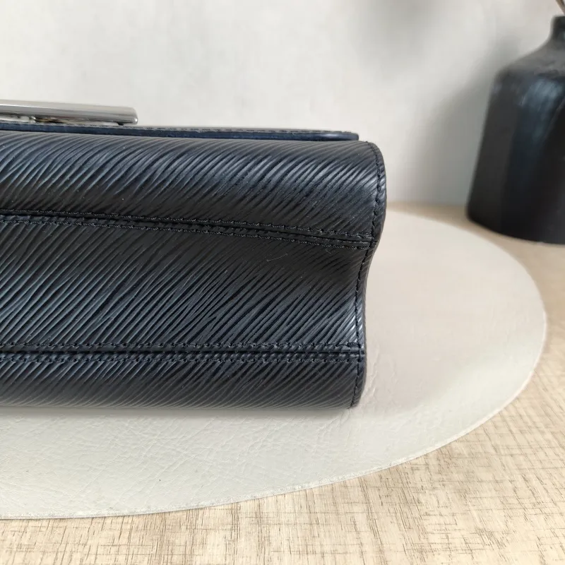 Louis Vuitton Crossbody Bag Twist Black Epi Embossed Calfskin Medium 23 × 9.5 × 17 cm — detail view 9 of 13
