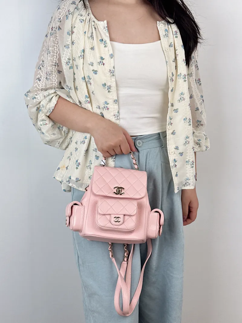 Chanel Backpackduma Grained Calfskin Small18 × 9.5 × 19 cm — on-model view 1 of 3