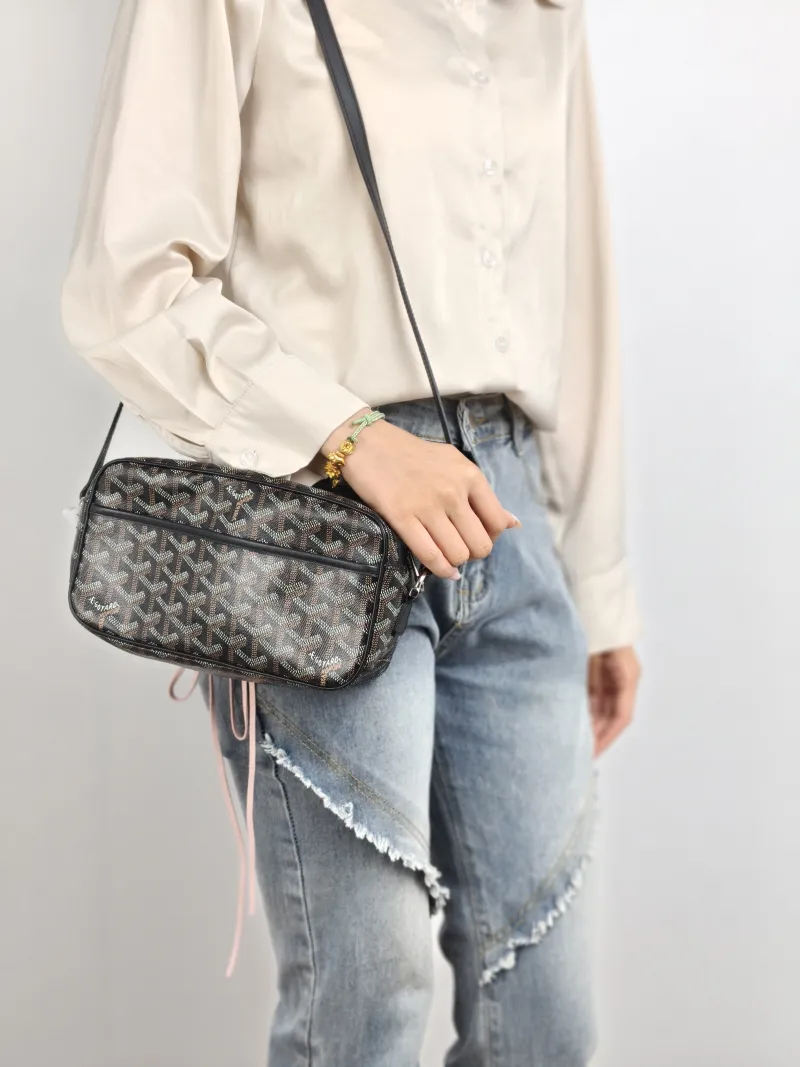 GOYARD Crossbody Bag Black PVC Small 22 × 6.5 × 13 cm — on-model view 1 of 2
