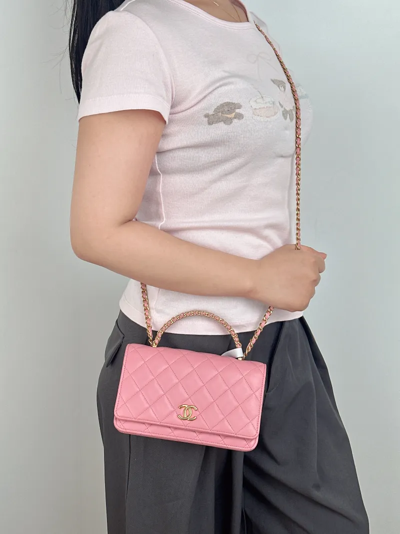 Chanel Crossbody Bag Edition woc Pink Lambskin Mini 19.2 × 3.5 × 12.3 cm Microchip Edition — on-model view 1 of 2