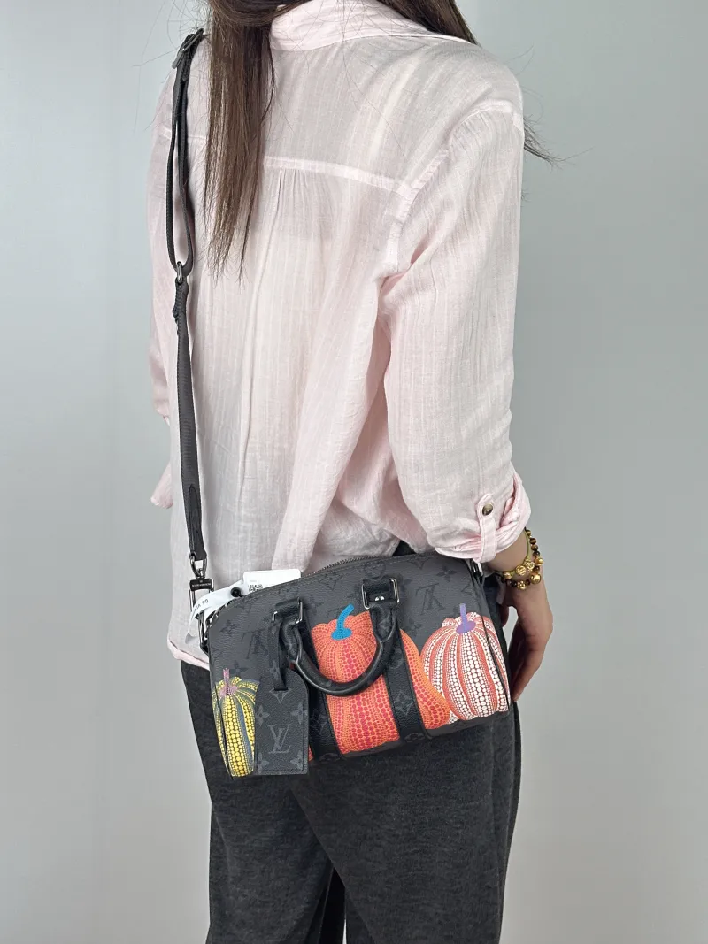 Louis Vuitton Crossbody Bag Keepall 25 PVC Medium25 × 11 × 15 cm — on-model view 2 of 2