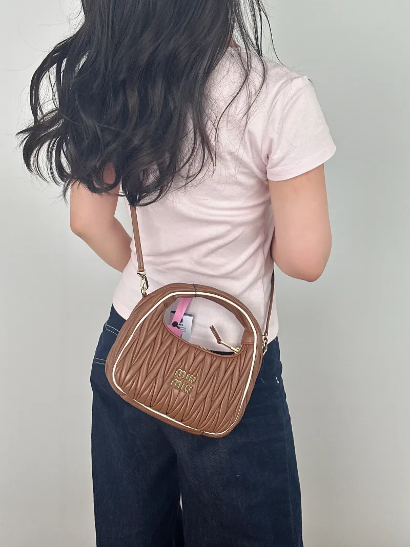 Miumiu Shoulder Bag Wander Matelassé Hobo Lambskin Small 20 × 6 × 17 cm — on-model view 2 of 2
