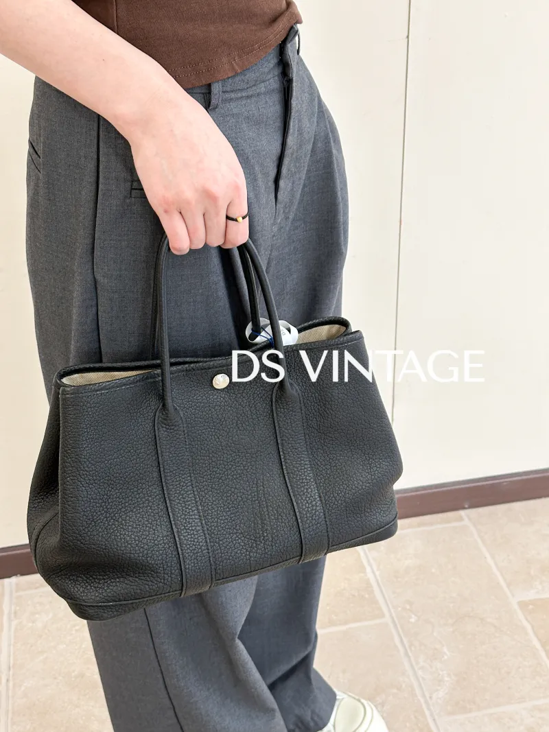 Hermès Top Handle Bag Garden Party 30 30Black Negonda Calfskin Medium30 × 13 × 21 cm — on-model view 3 of 3