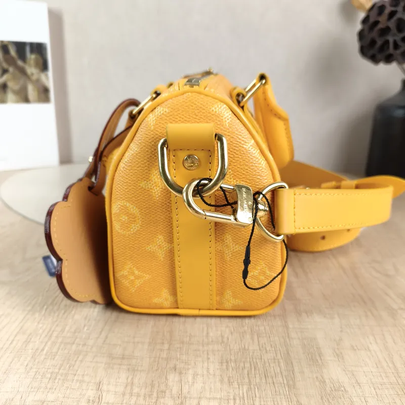 Louis Vuitton Crossbody Bag Keepall 25 Collection Yellow PVC Medium 25 × 11 × 15 cm — detail view 6 of 12