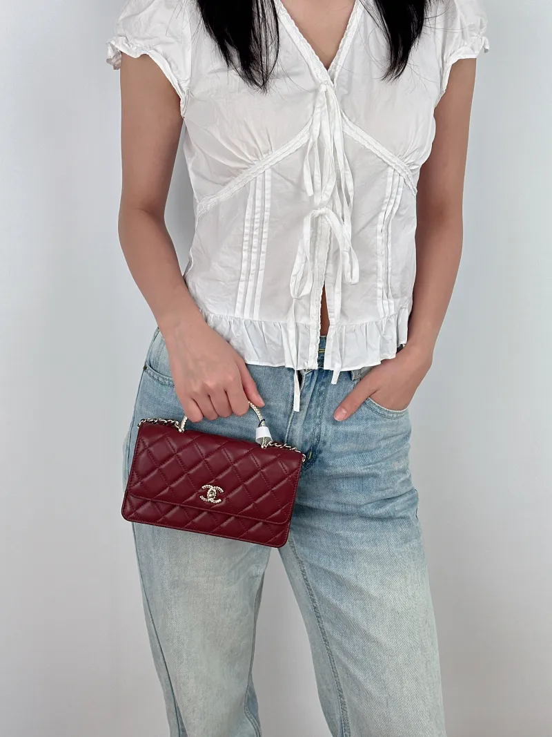 Chanel Crossbody Bag C woc Burgundy Lambskinmini19.2 × 3.5 × 12.3 cm — on-model view 2 of 3