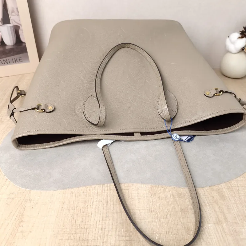 Louis Vuitton Shoulder Bag Neverfull Empreinte Embossed Calfskin Medium 31 × 14 × 28 cm — detail view 10 of 12